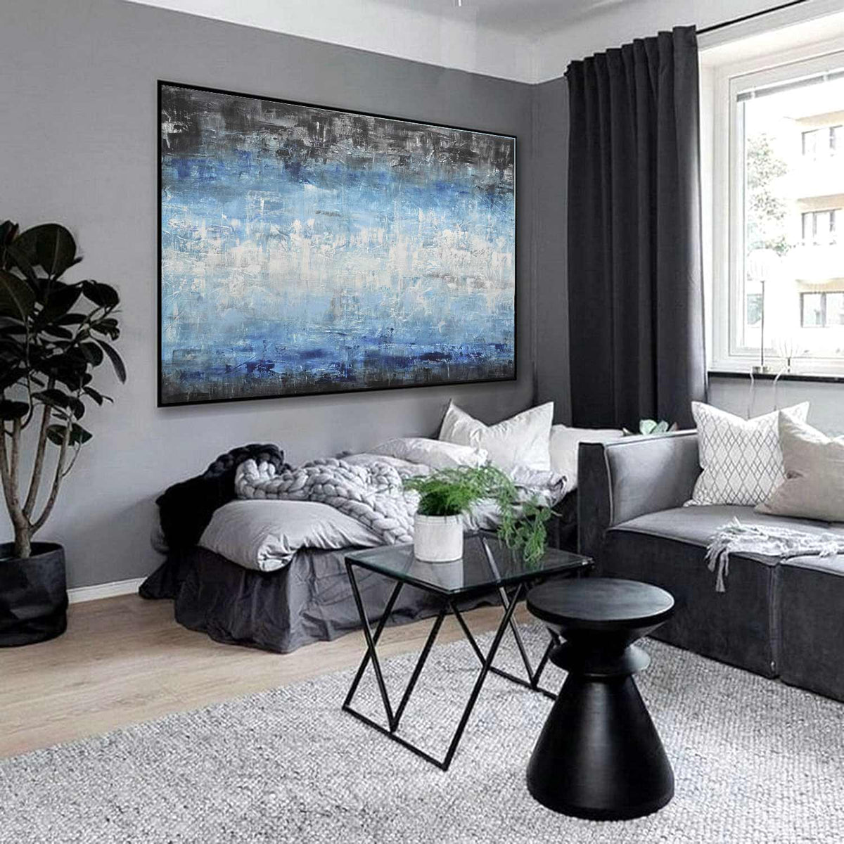 modern painting above bed