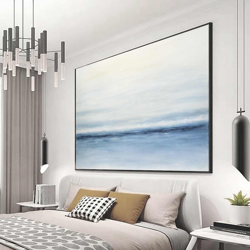 large painting above bed